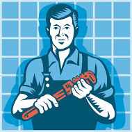 Man holding plumbing tool